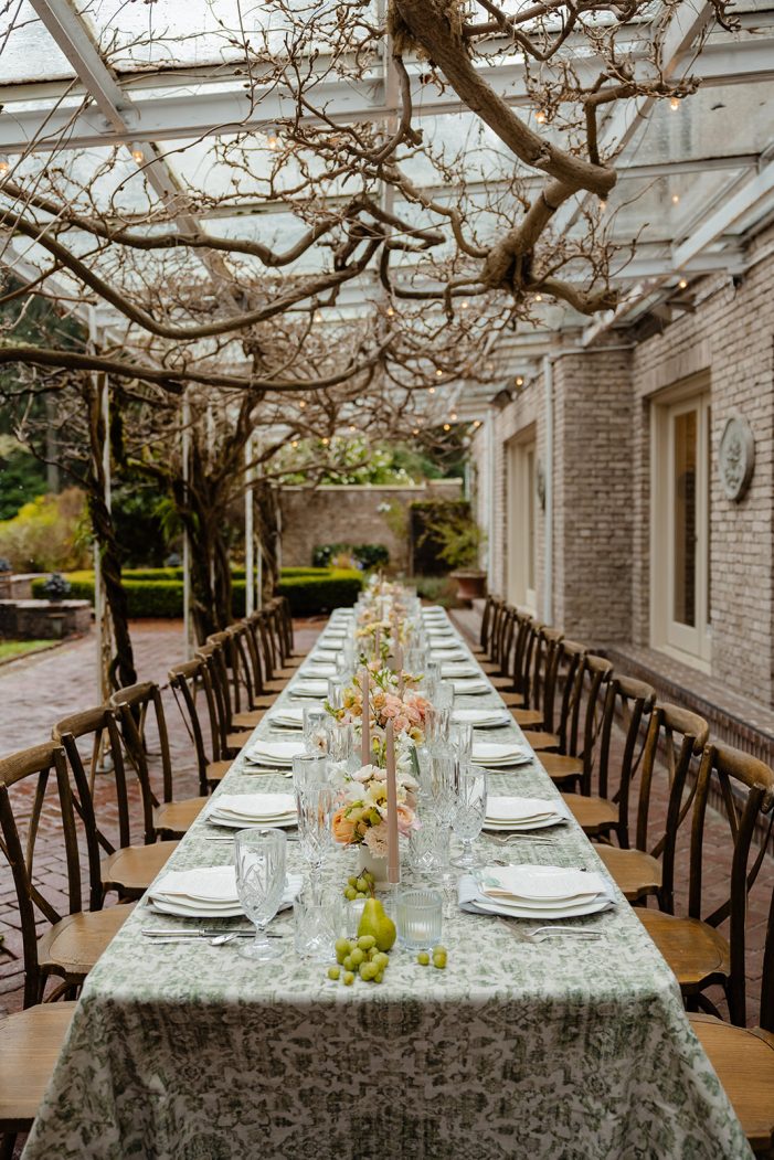 table under awning at lakewold gardens