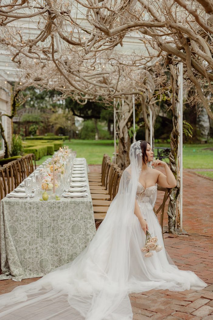 table under awning at lakewold gardens