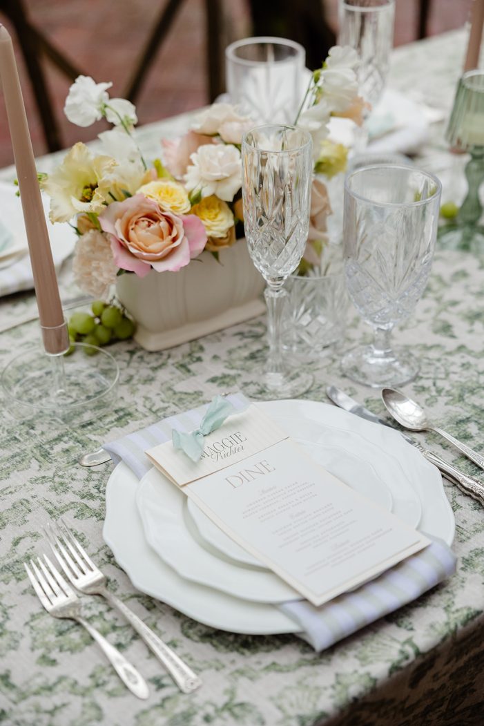 table under awning at lakewold gardens