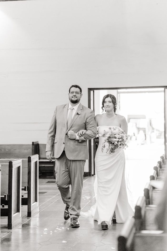 bride walks down aisle