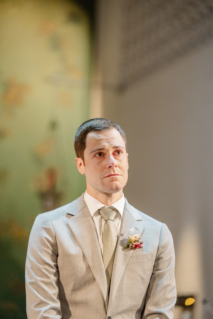 groom at front of aisle
