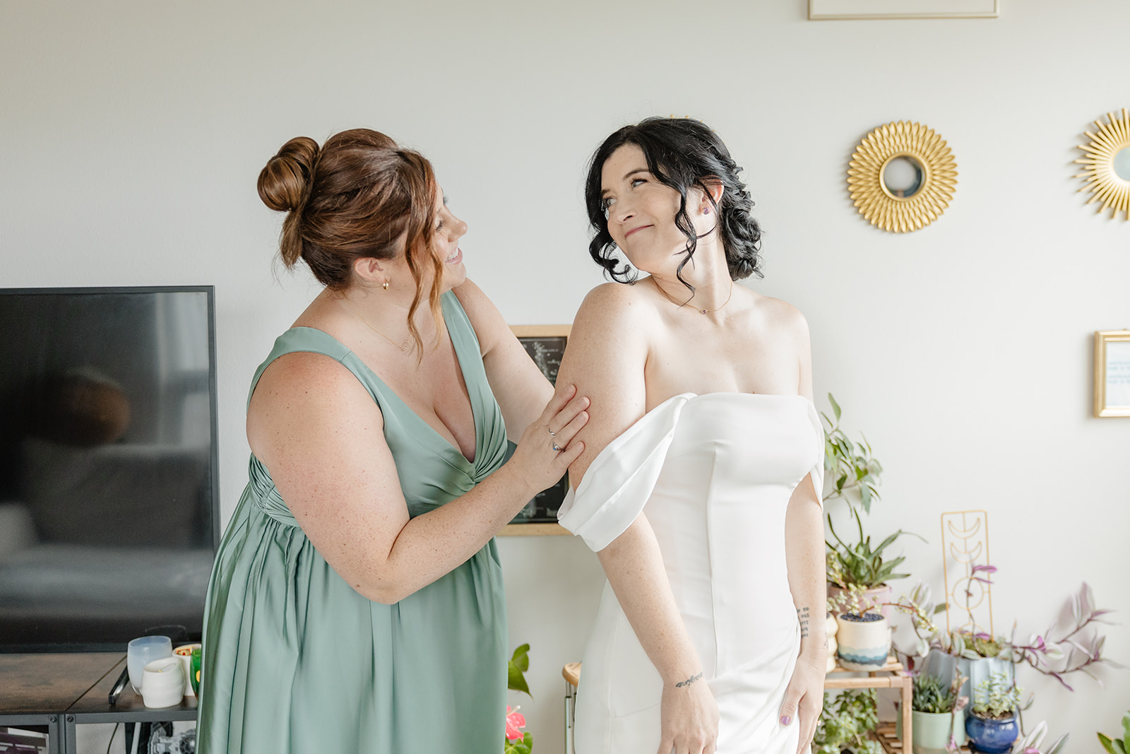 bride looks back at mom