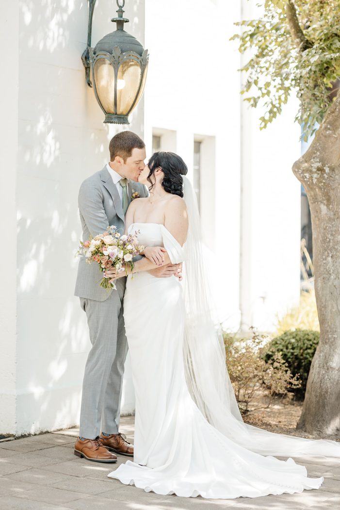 bride and groom kissing