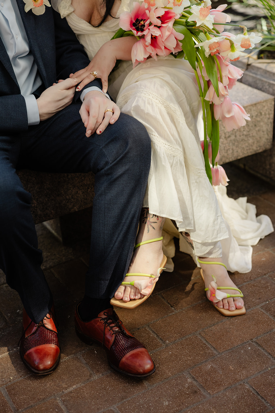 floral shoes boho bride elopement whimsical couple leaning together before wedding ceremony