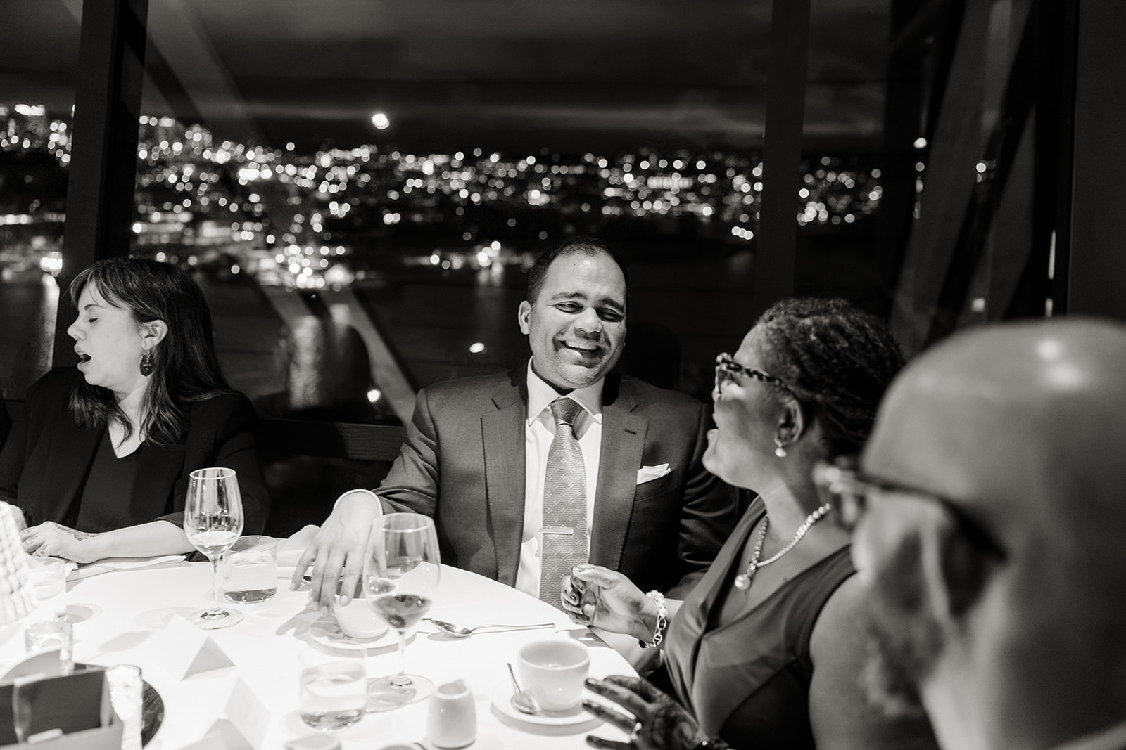 groom laughs with guests