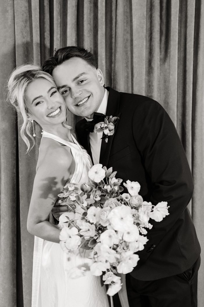 bride and groom smile