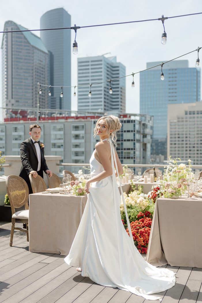 bride smiles over shoulder
