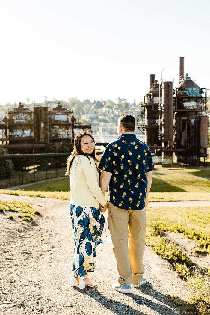 couple walks towards gas works park