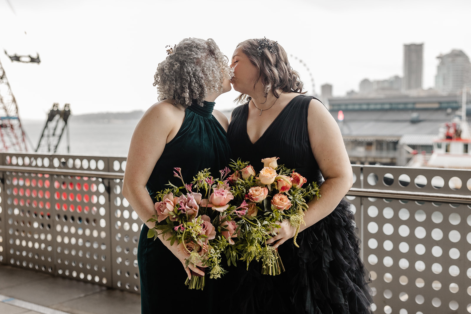 two brides with seattle in background