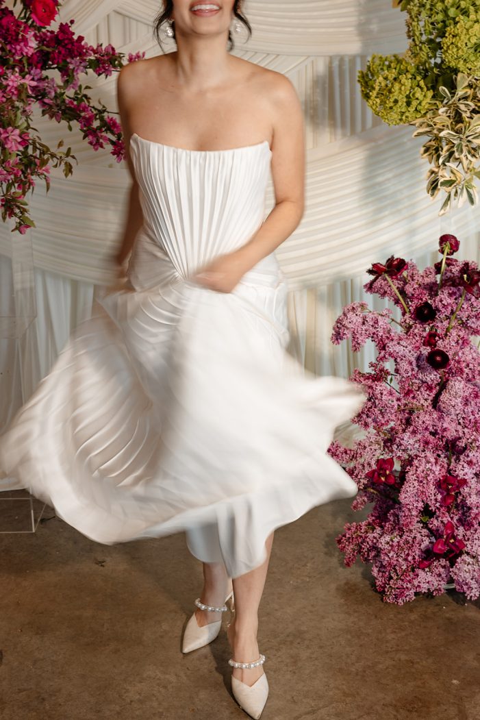 bride swishes skirt