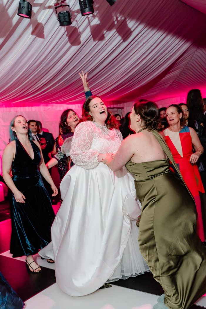 bride dances with guests