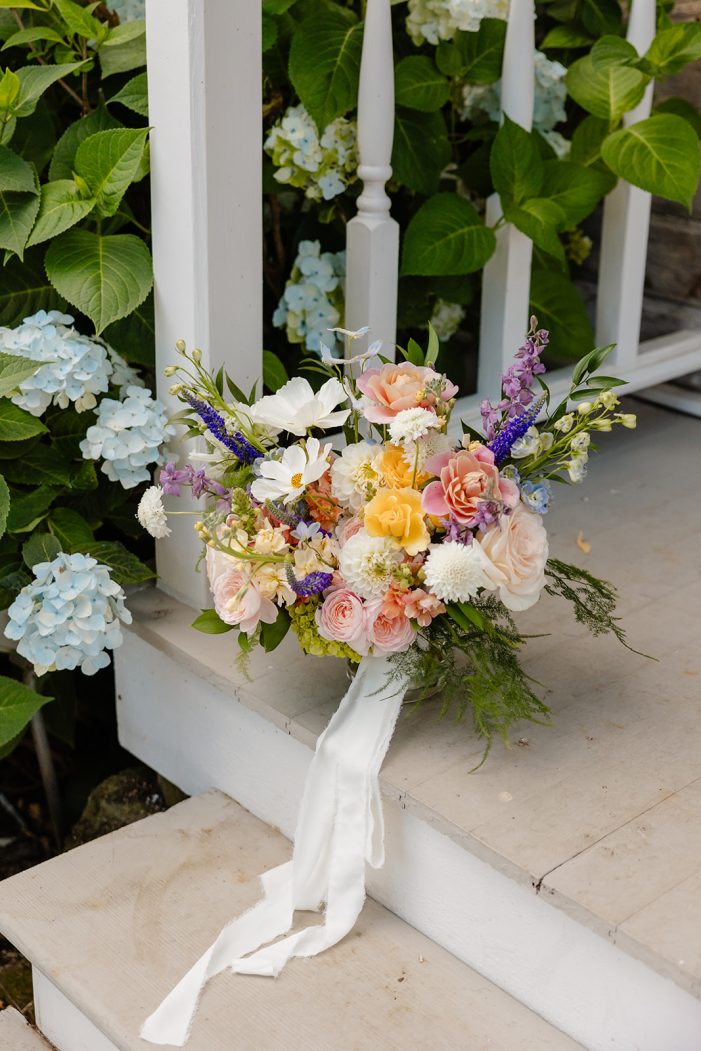 wild flower bouqet on stairs