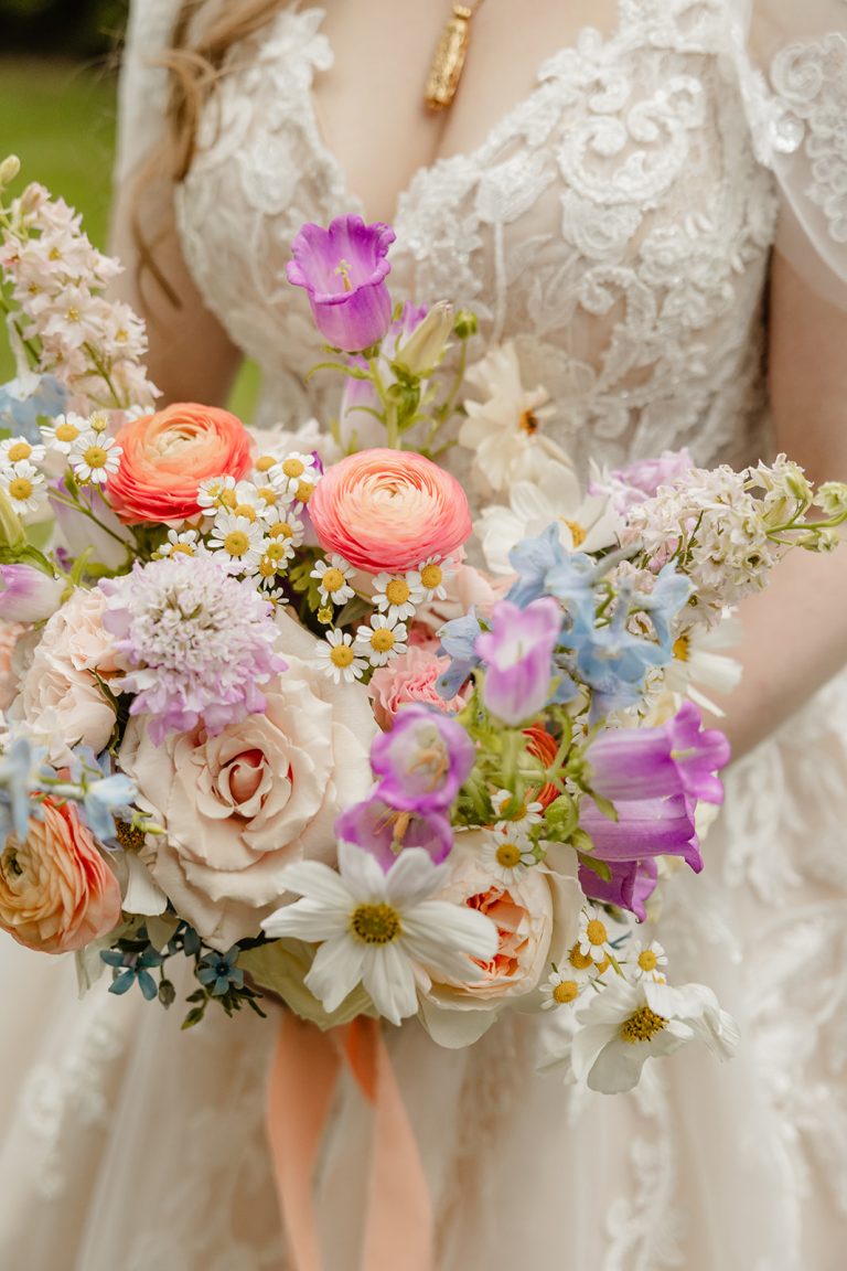 bride with wildflower bouquet