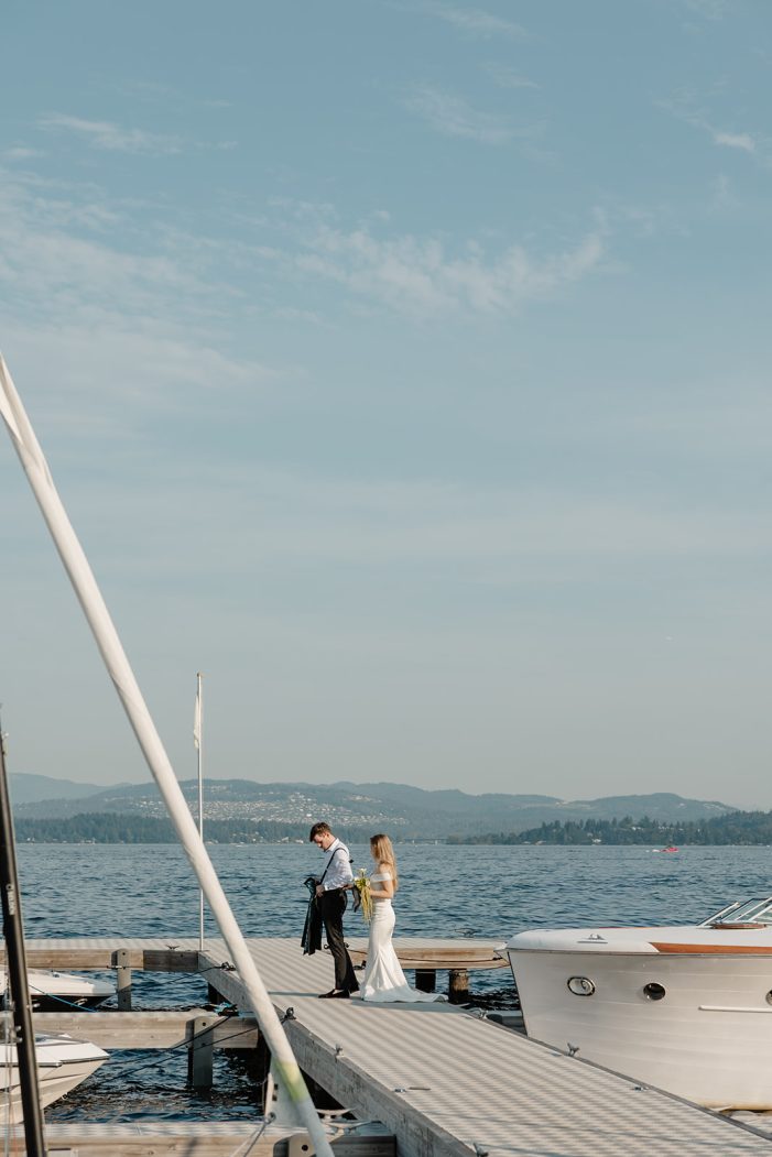 bride and groom walk on deck