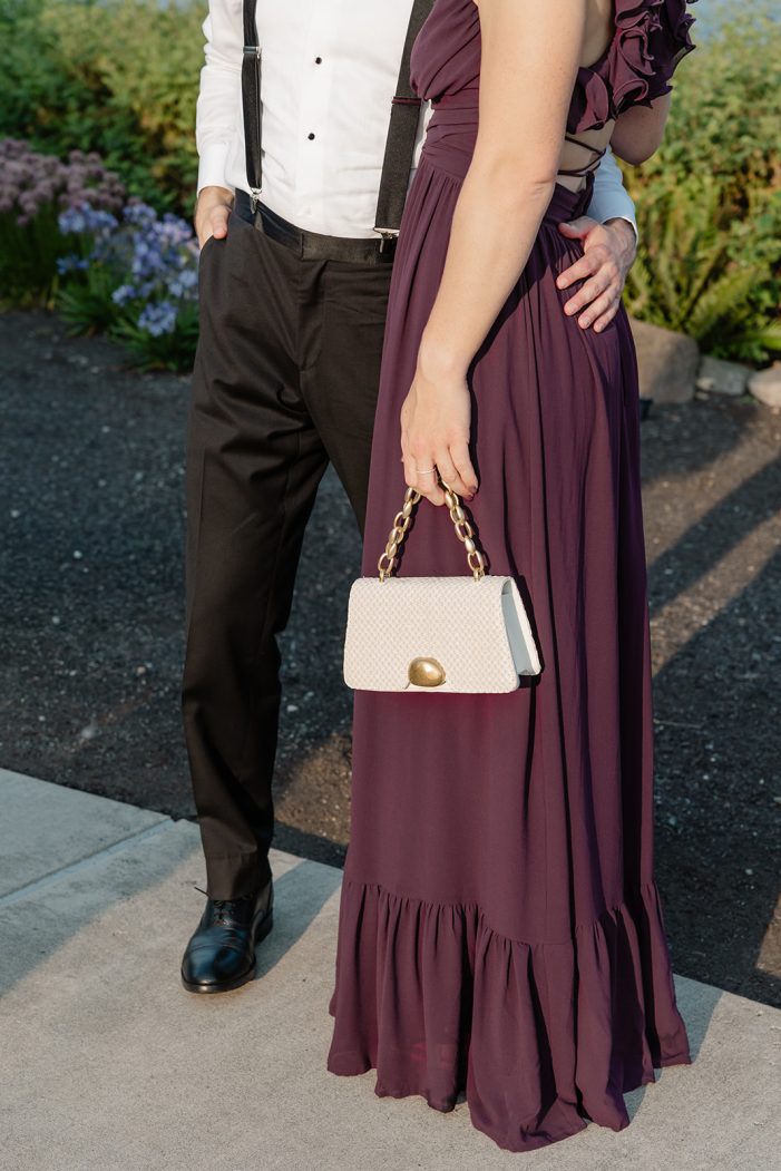 close on bag against purple dress